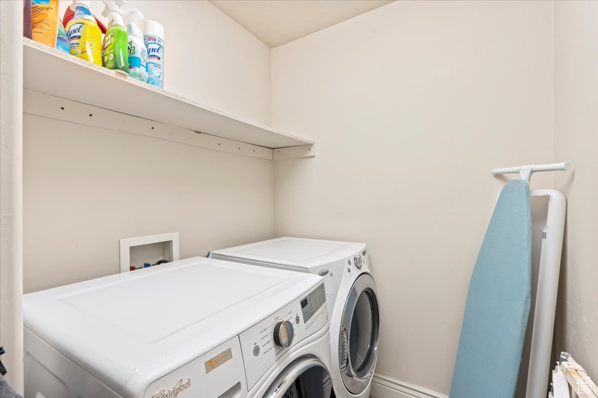 Clothes washing area with separate washer and dryer