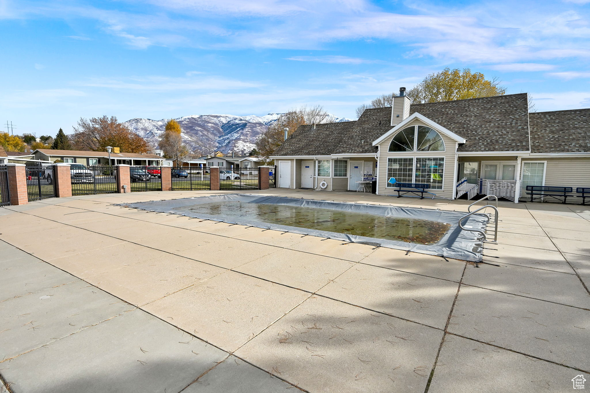 View of swimming pool with a mountain view and a patio area