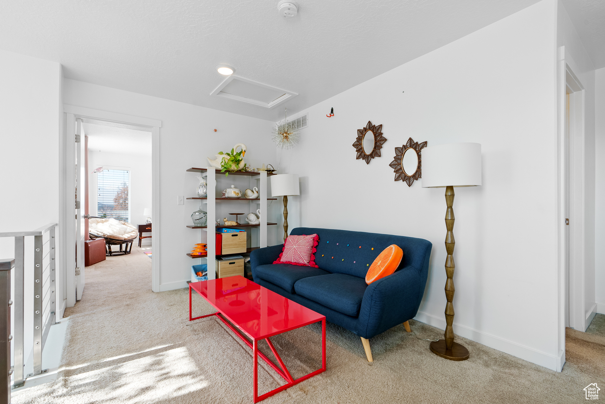 Sitting room with carpet flooring