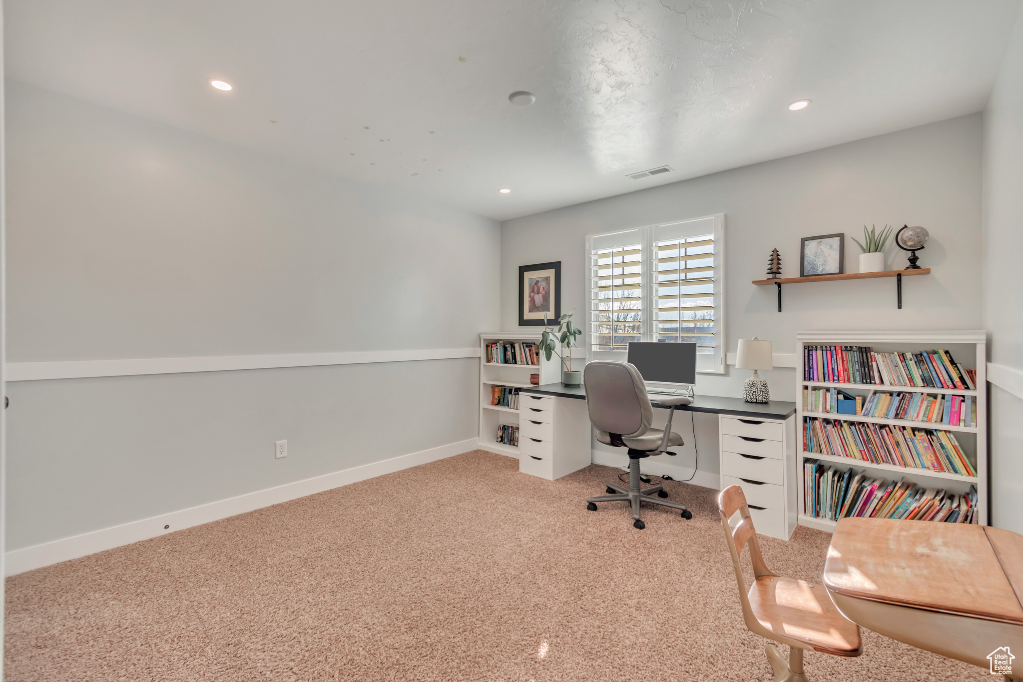 View of carpeted home office