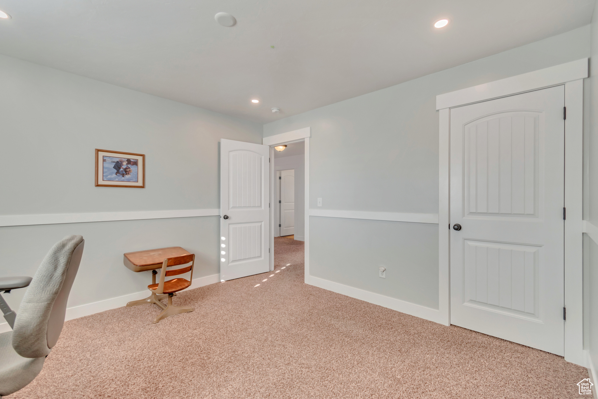 View of carpeted home office