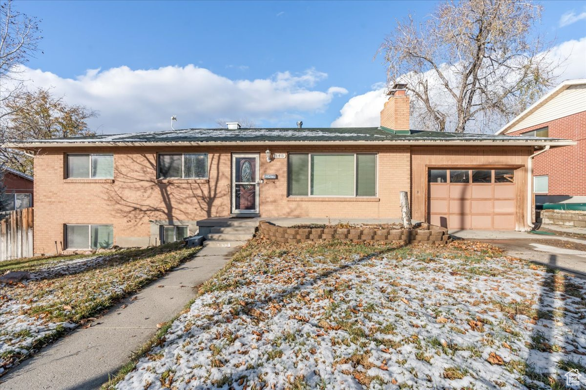 View of front of home with a garage