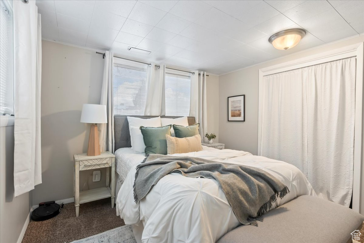 Bedroom featuring carpet flooring