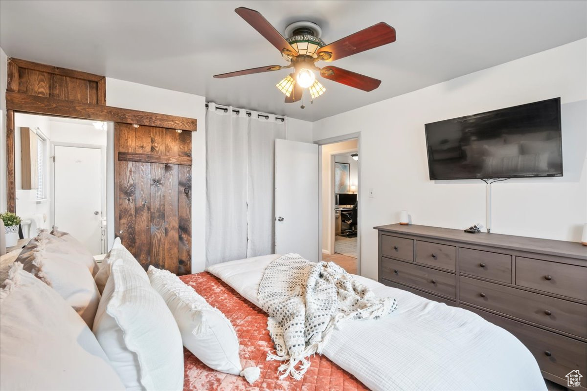 Bedroom featuring ceiling fan