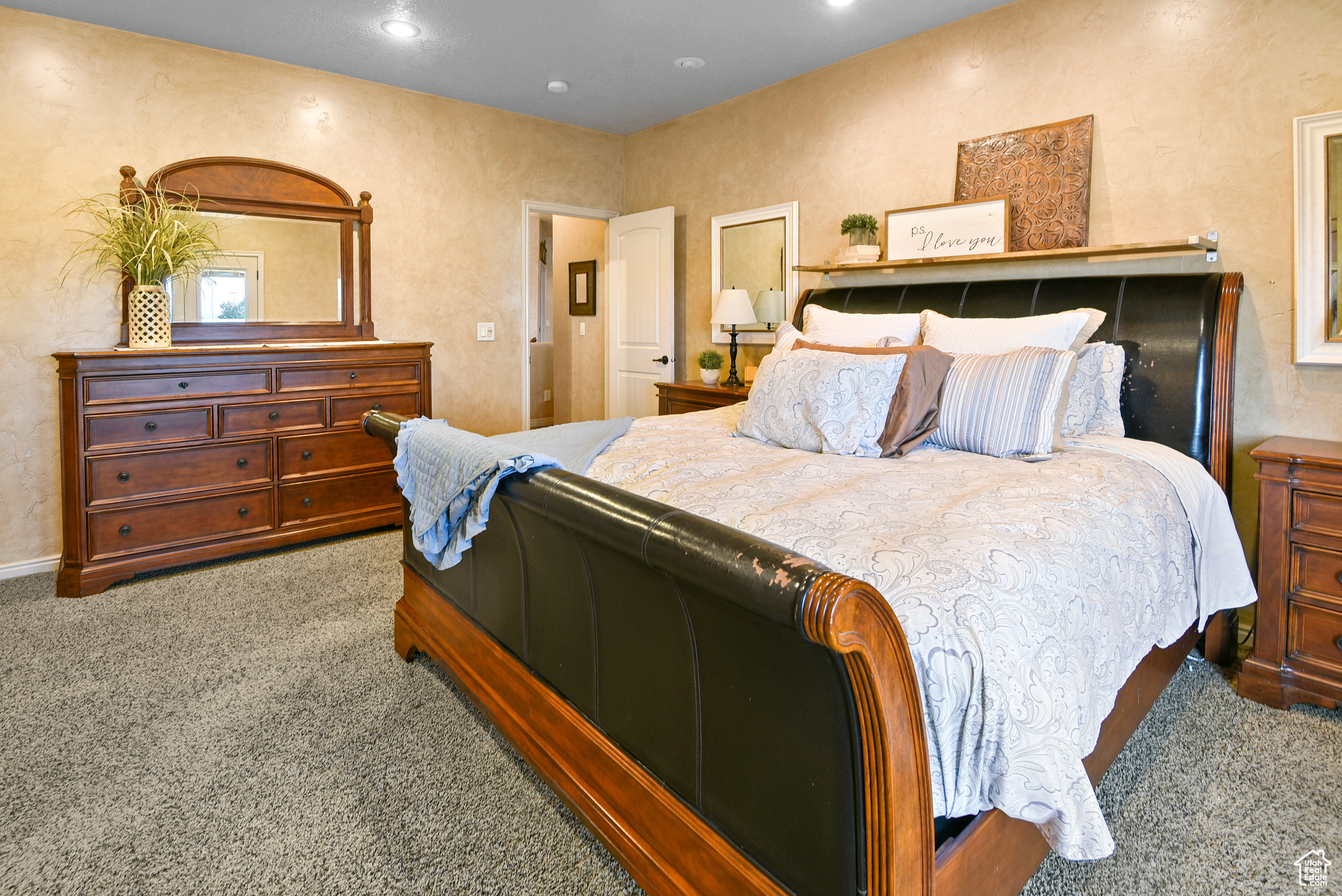 Bedroom with carpet flooring