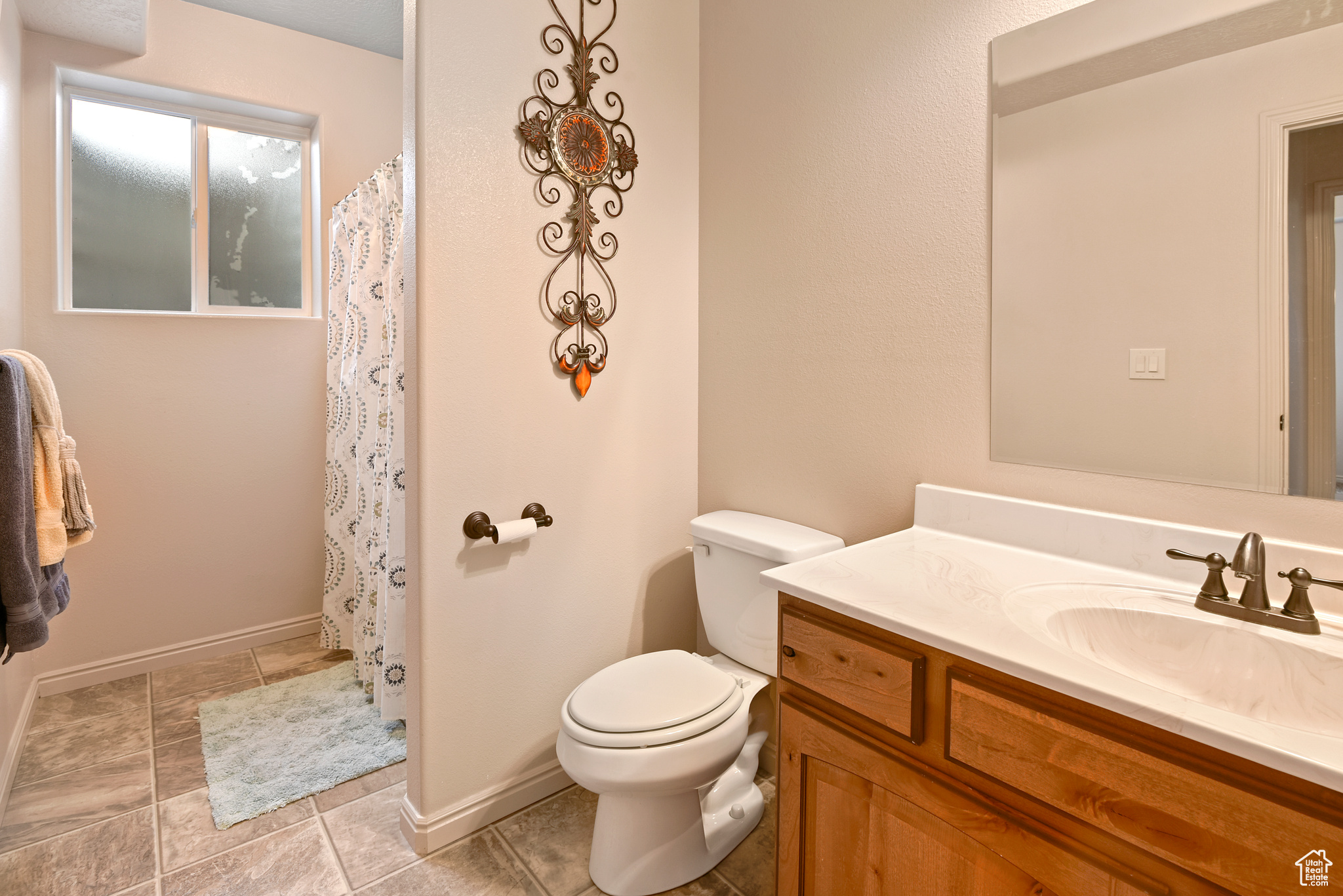 Bathroom with vanity and toilet