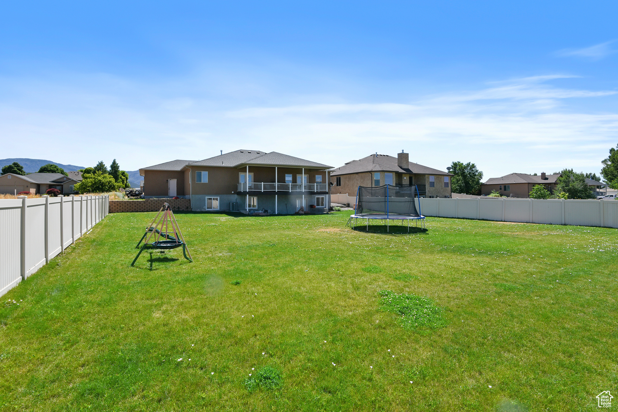 View of yard with a trampoline