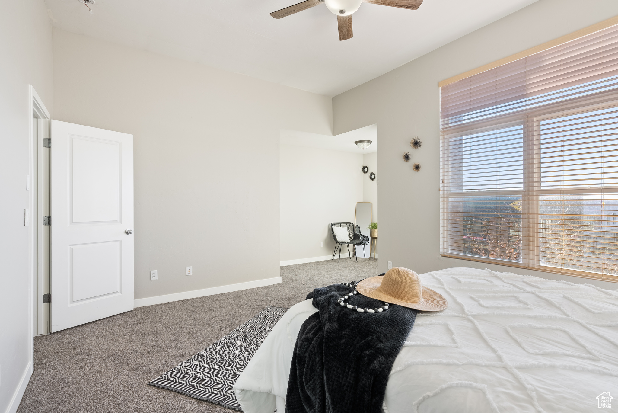 Bedroom featuring carpet flooring and ceiling fan