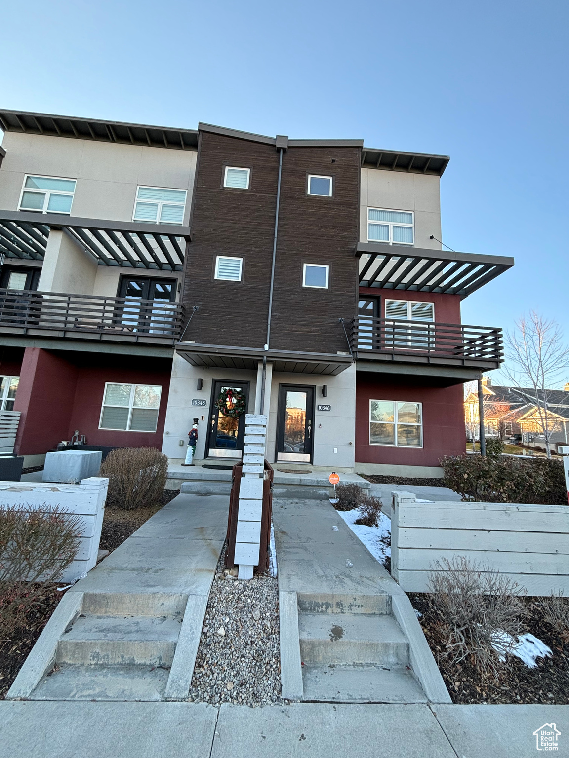 View of this ideal property featuring a balcony and end unit. Views into a park area facing East.