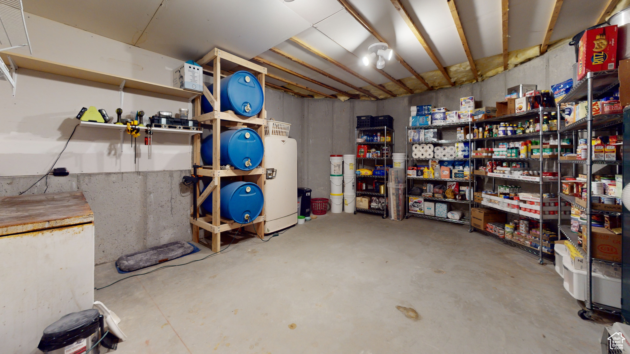 Basement featuring water heater