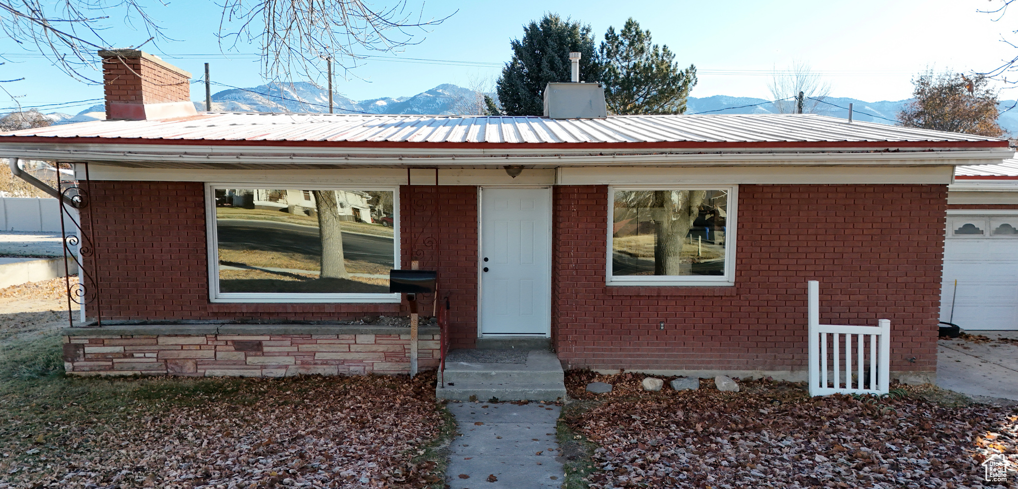 View of front of house with a mountain view