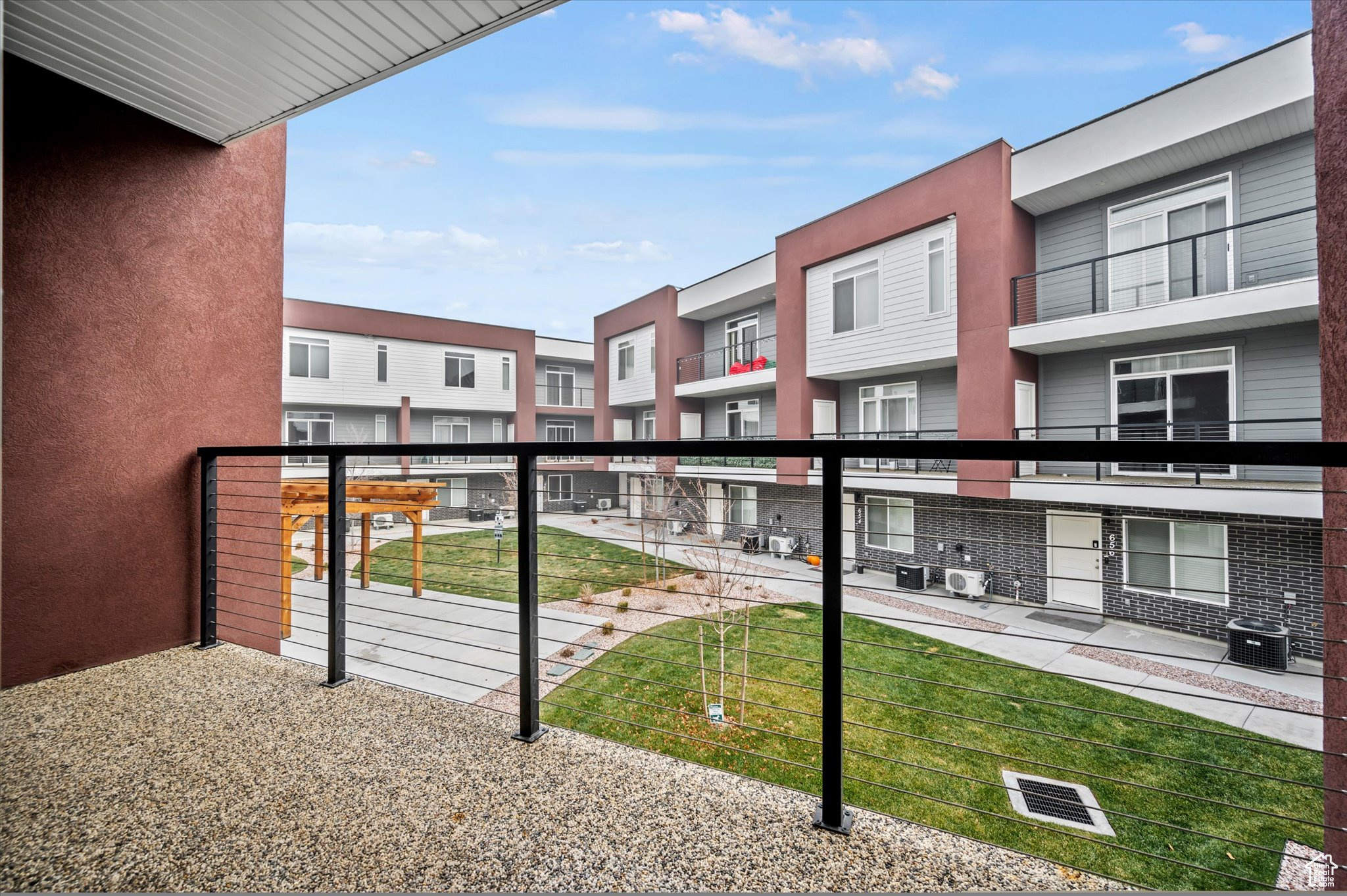 Balcony with central AC unit