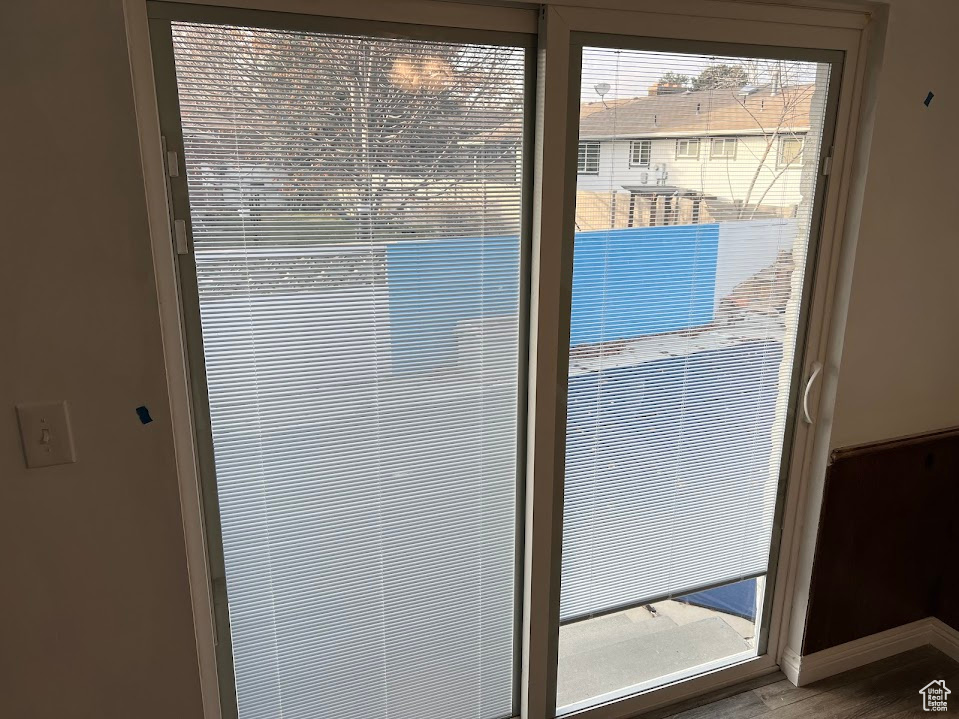 Double Pane Vinyl Slider w built in blinds.