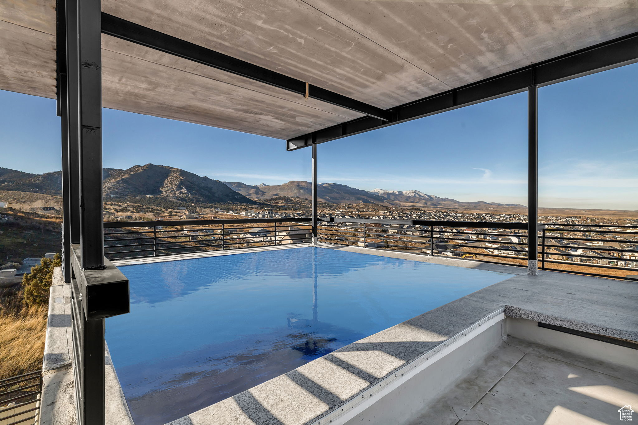 View of pool featuring a mountain view