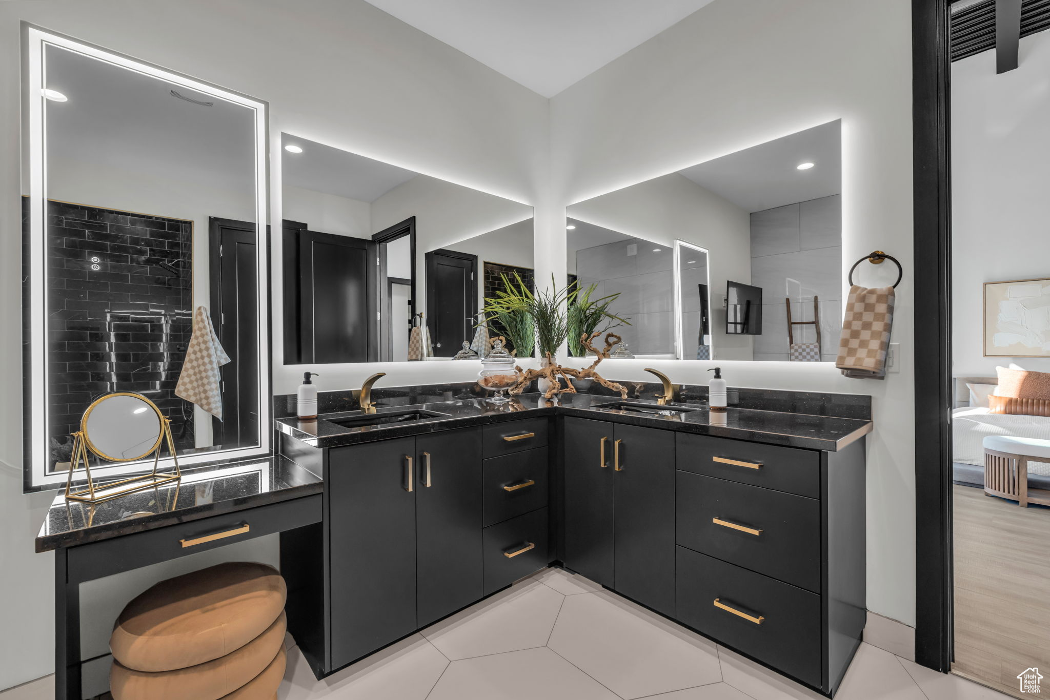 Bathroom with tile patterned flooring and vanity