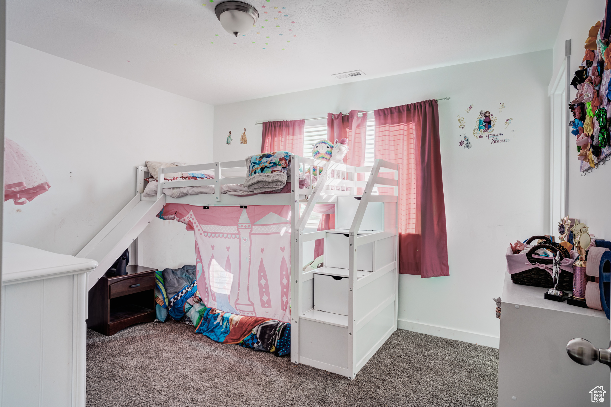 View of carpeted bedroom