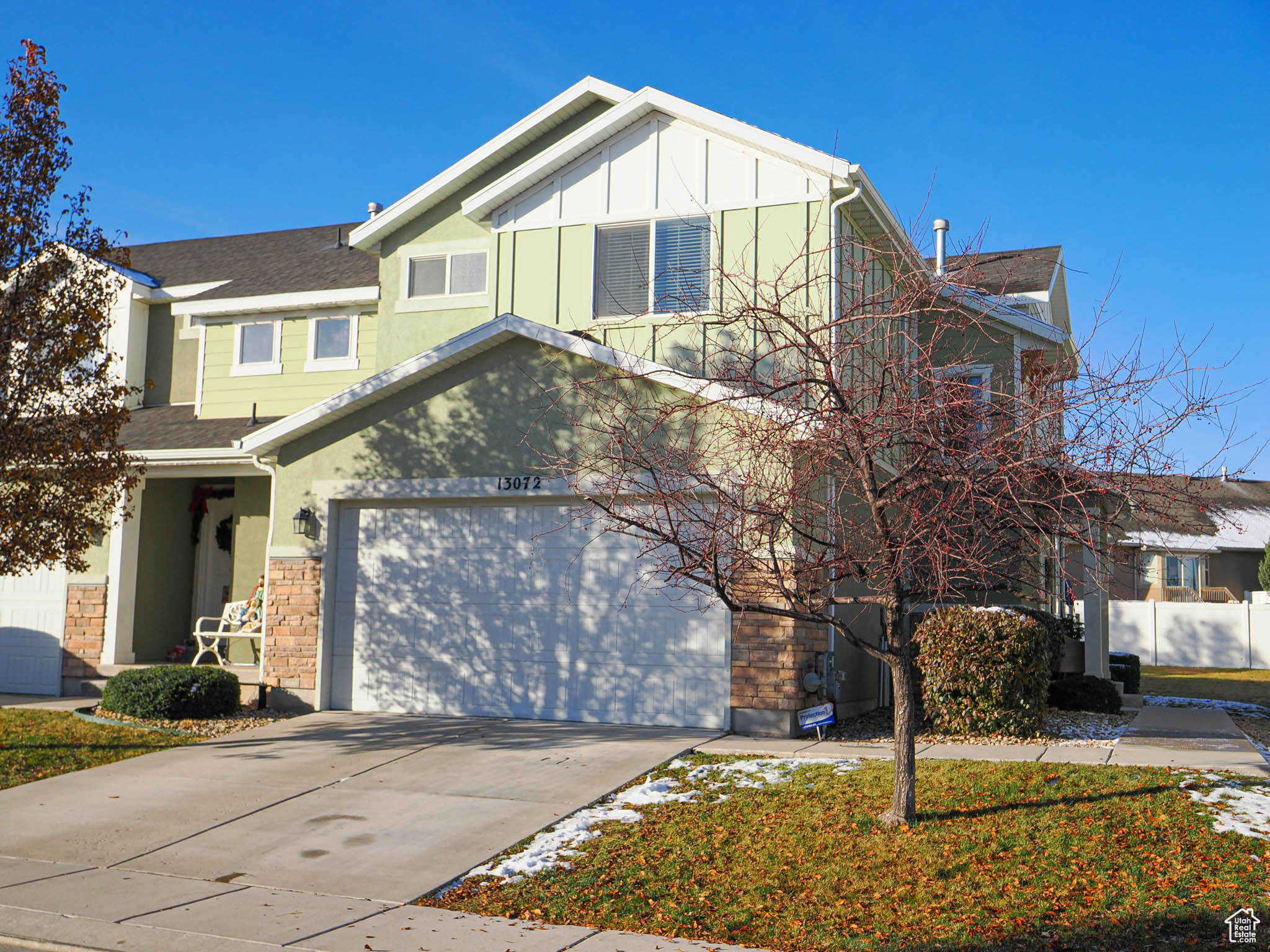 View of front of property with a garage