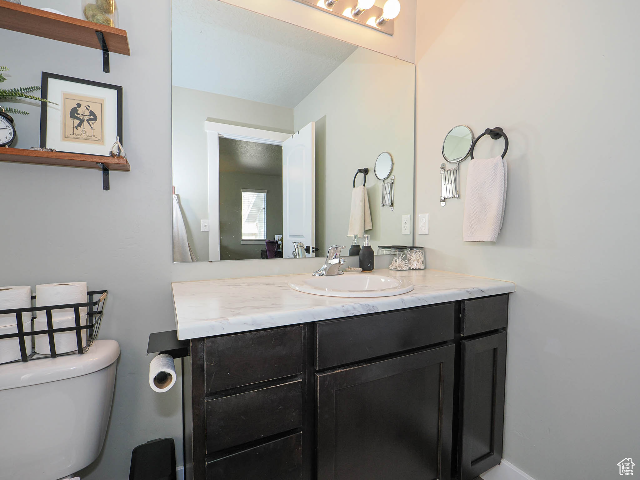 Bathroom with vanity and toilet