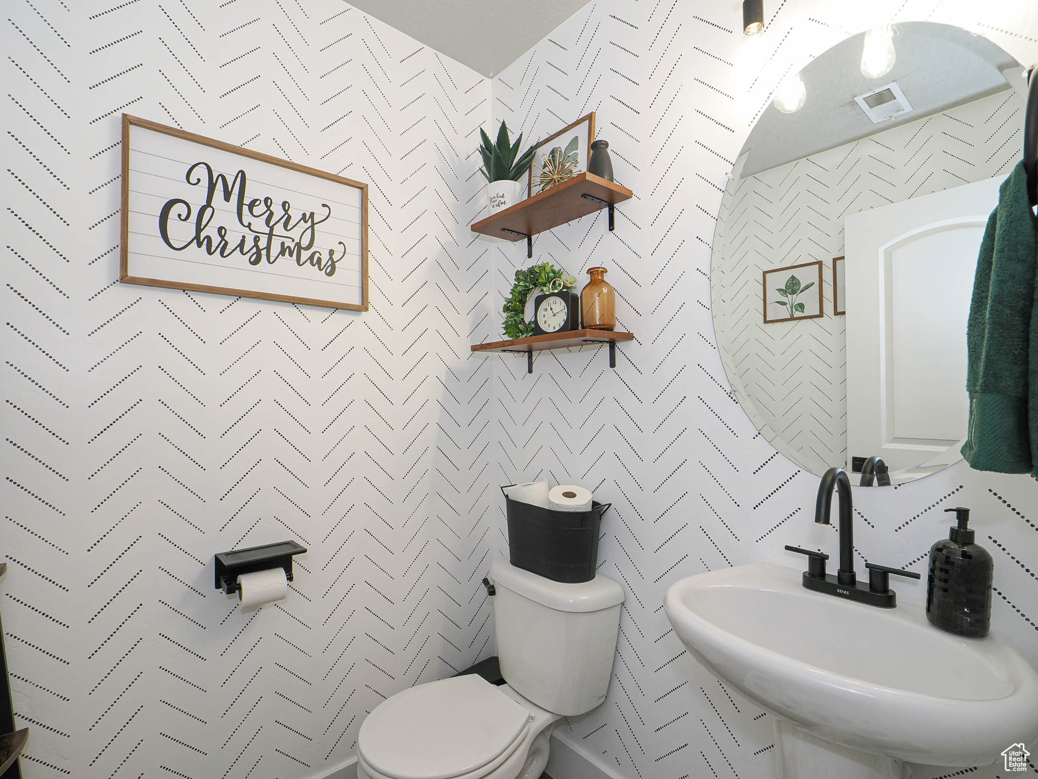 Bathroom featuring toilet and sink