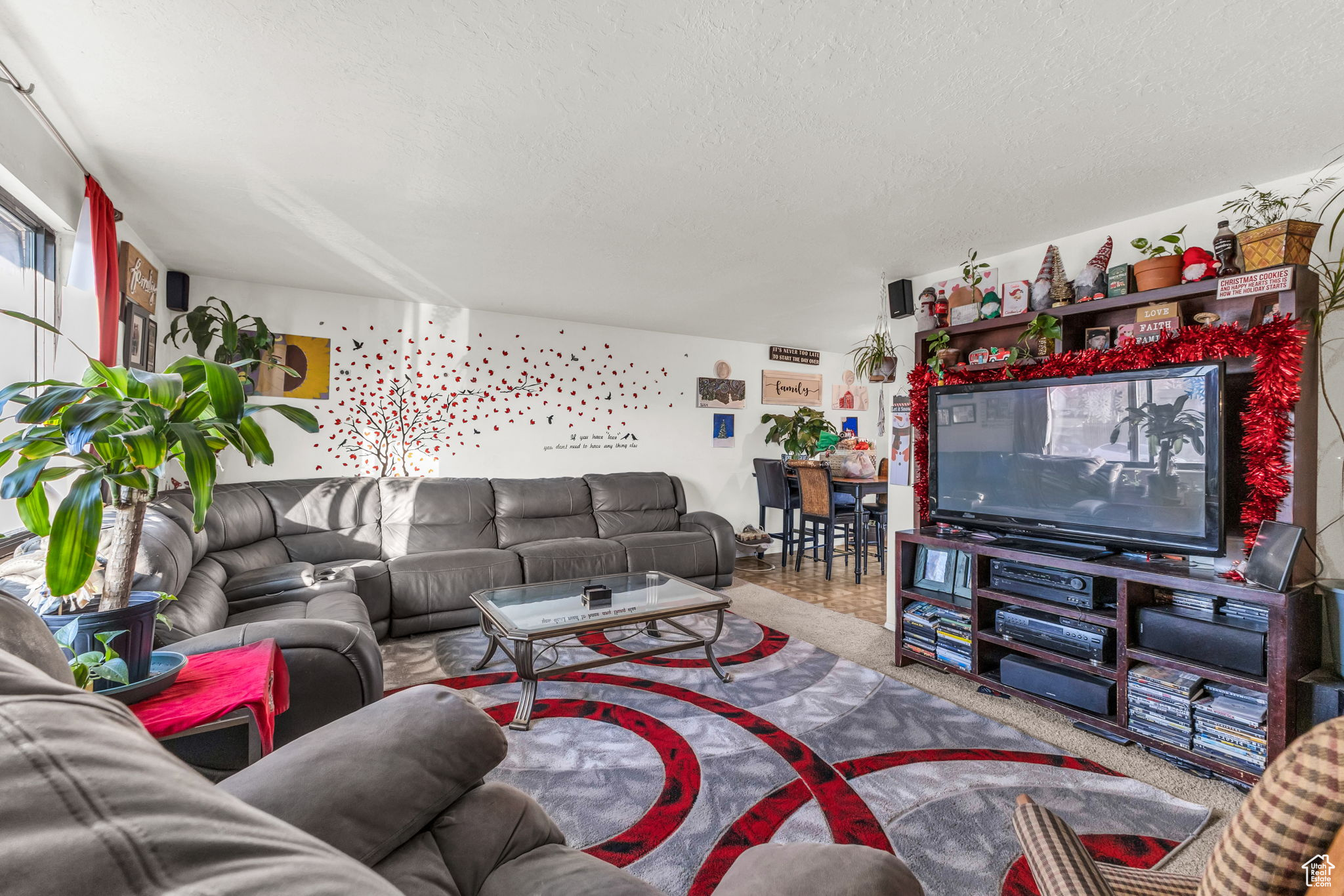 Living room featuring a textured ceiling