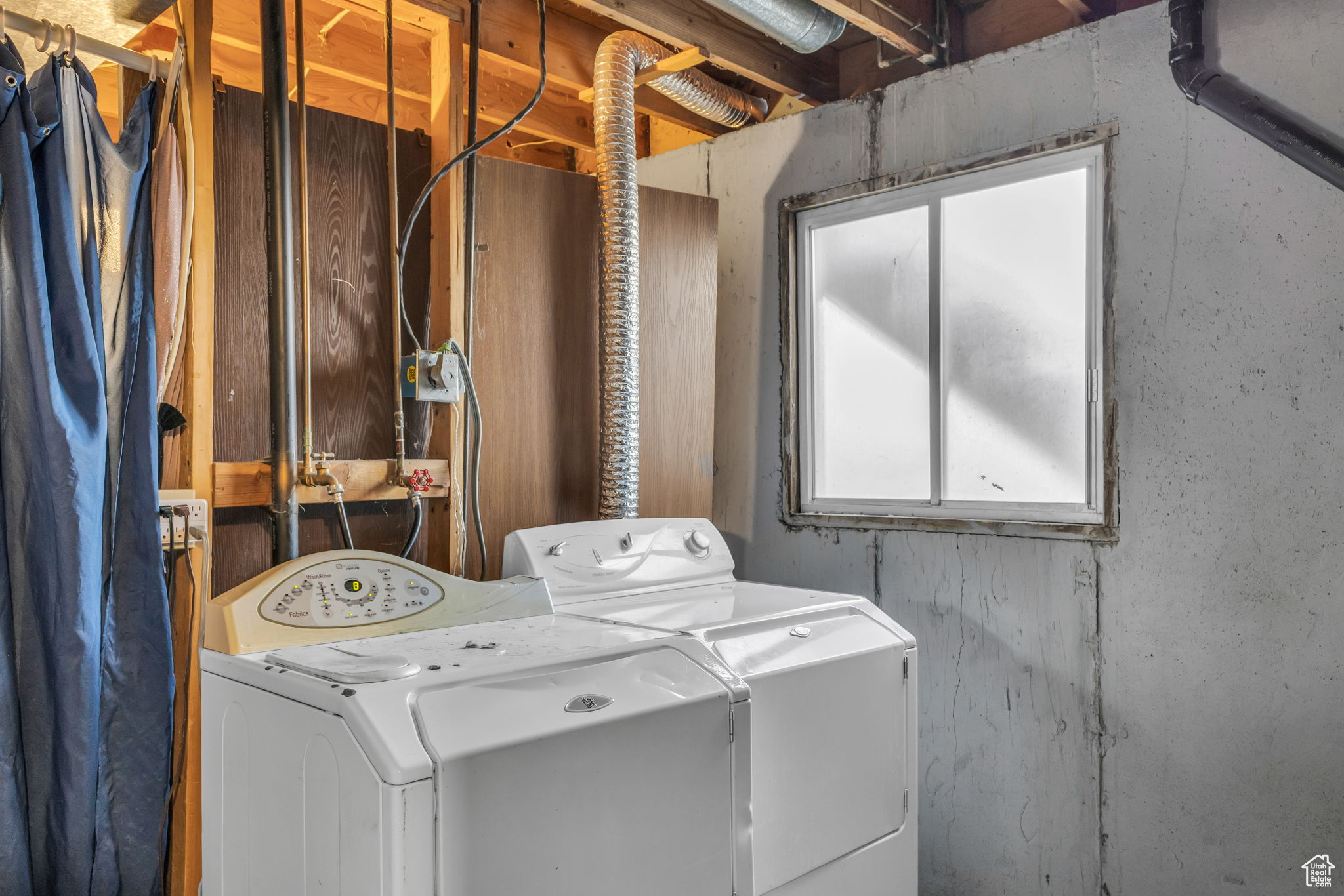 Laundry room featuring washer and dryer