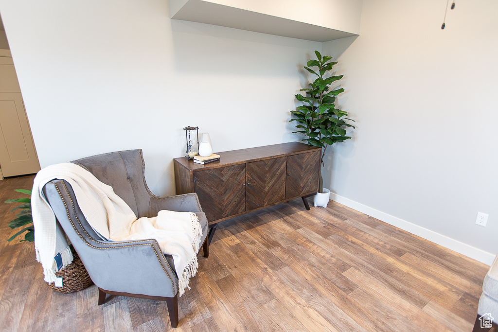 Living area featuring hardwood / wood-style flooring