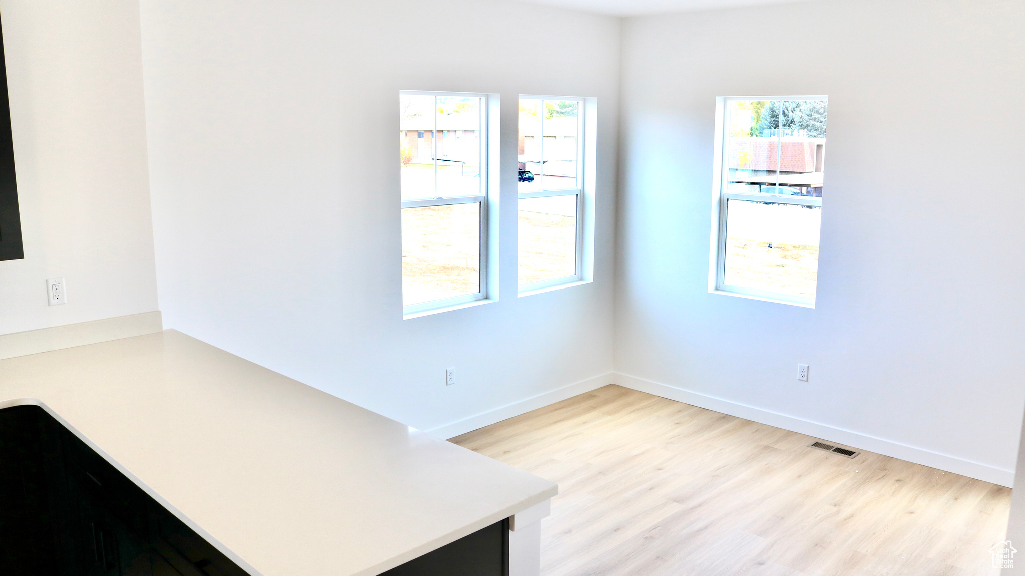 Spare room featuring light hardwood / wood-style floors