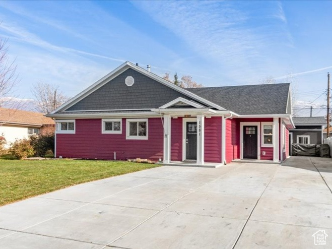 View of front of home with a front lawn