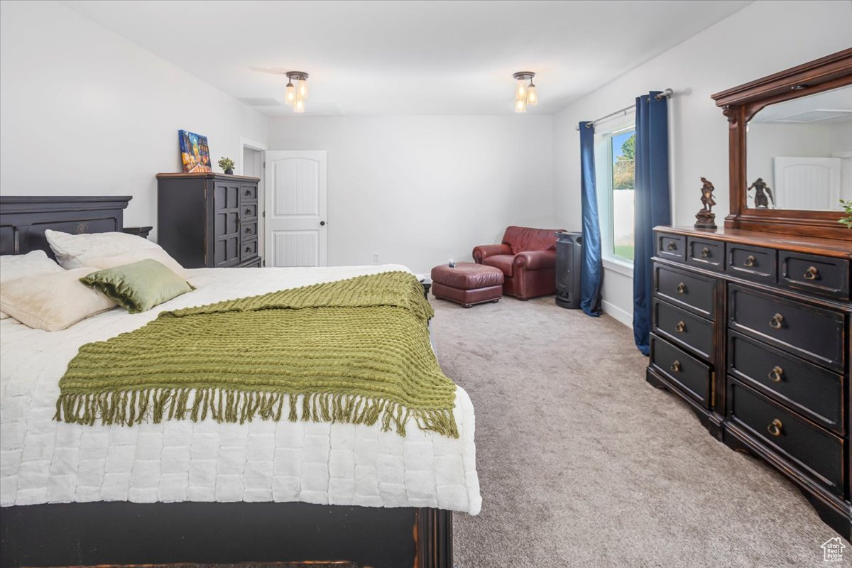 Bedroom with carpet flooring