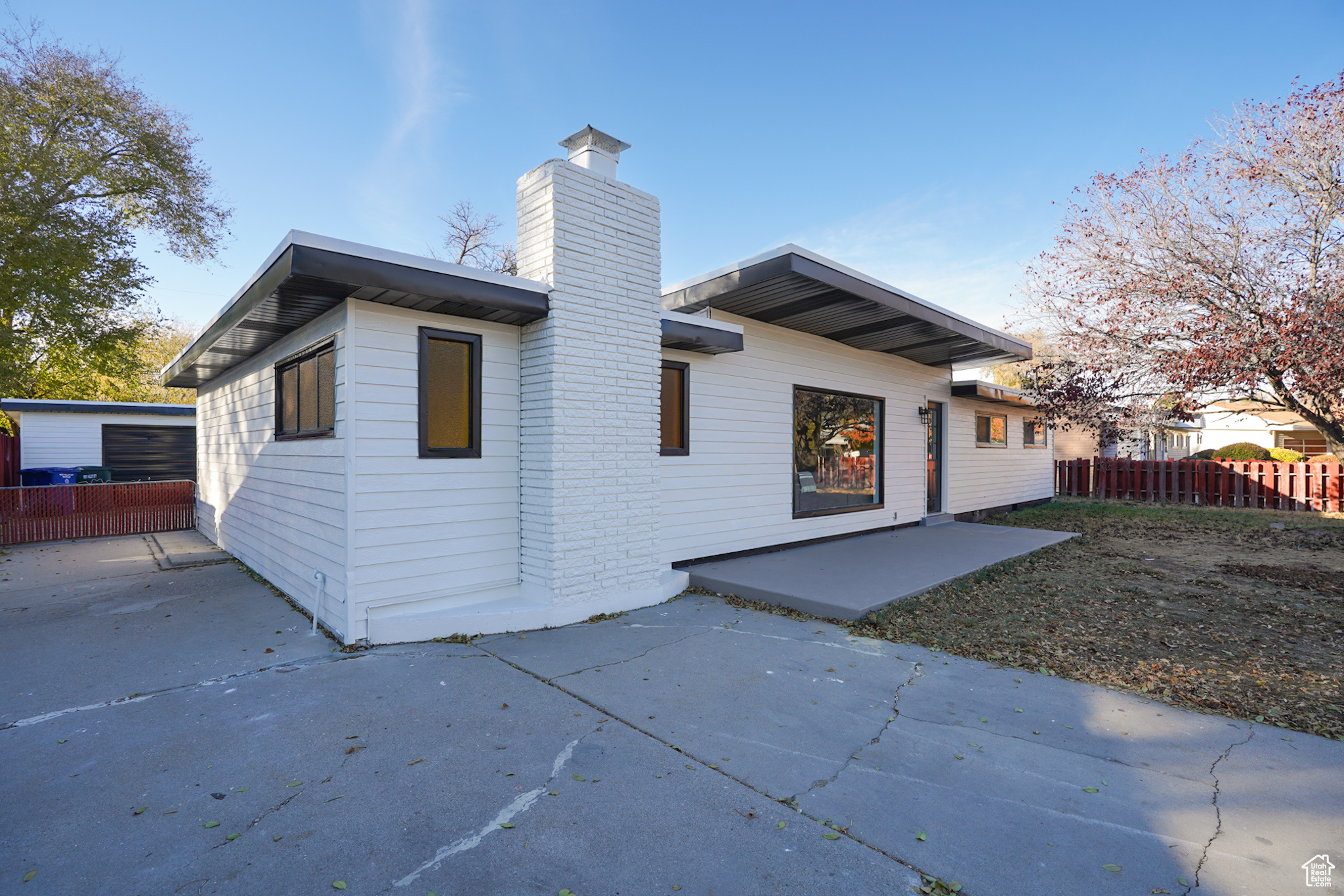 Rear view of house featuring a patio area