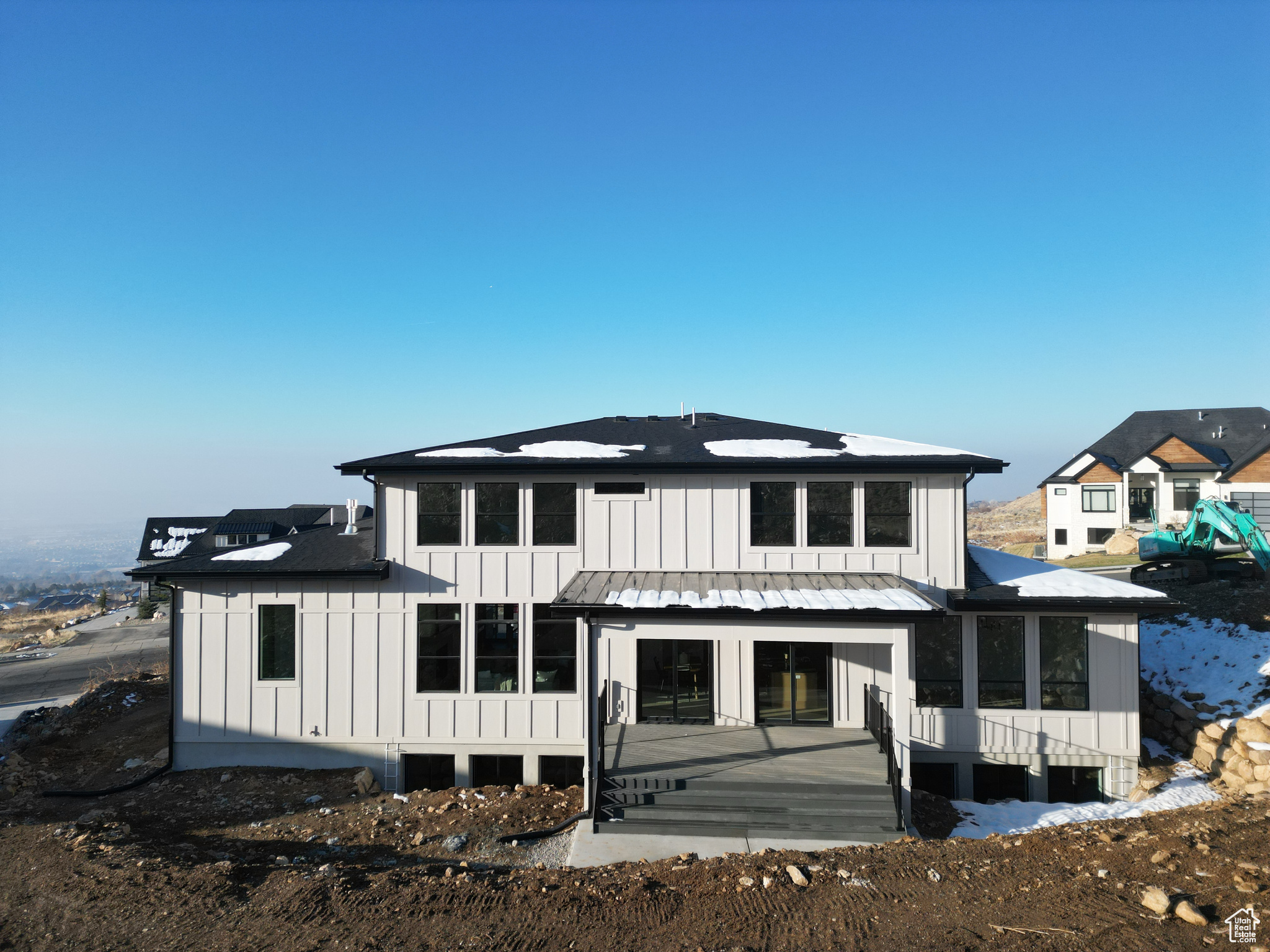 Rear view of house with a patio area