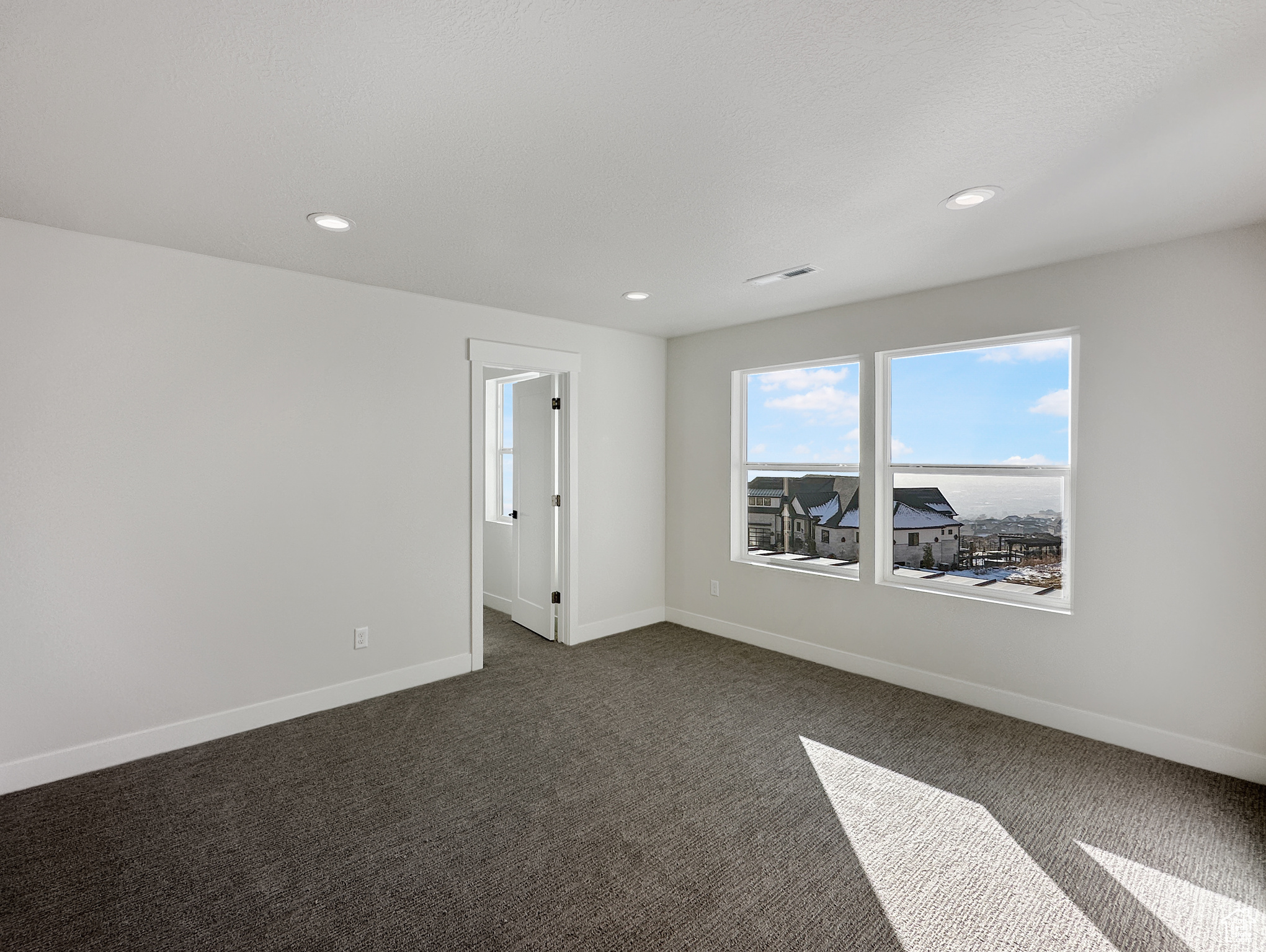 View of carpeted empty room