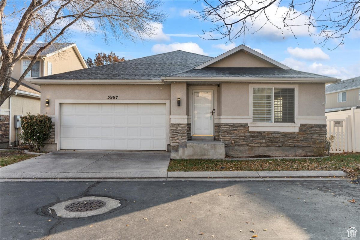 View of front of home featuring a garage