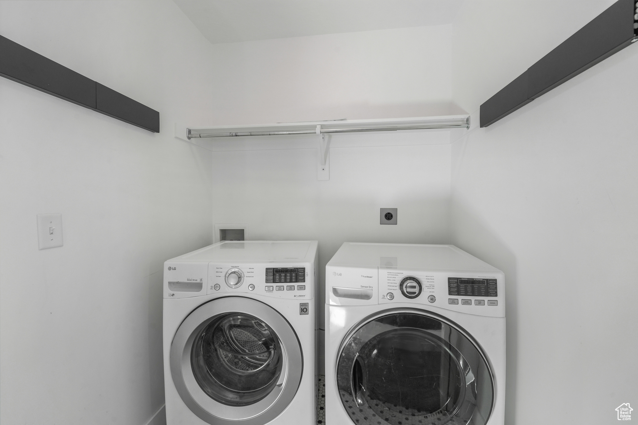 Laundry room with separate washer and dryer