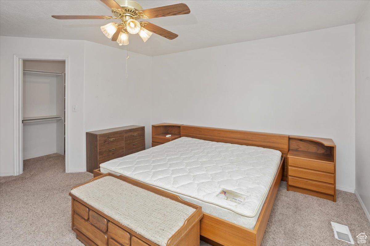 Master bedroom with large walk in closet and ensuite bathroom