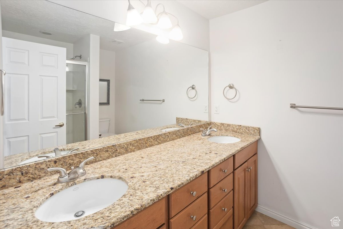 Ensuite bathroom with walk in shower.