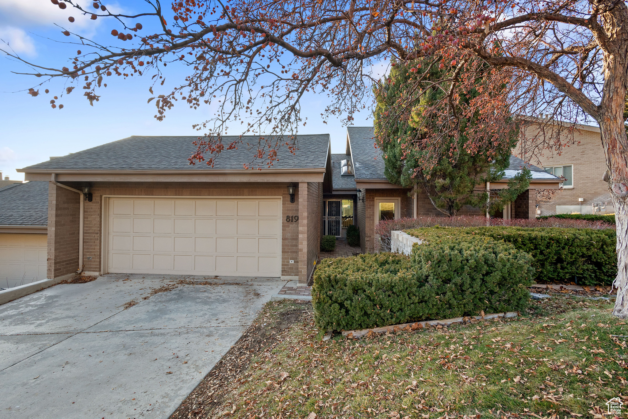 Ranch-style home featuring a garage