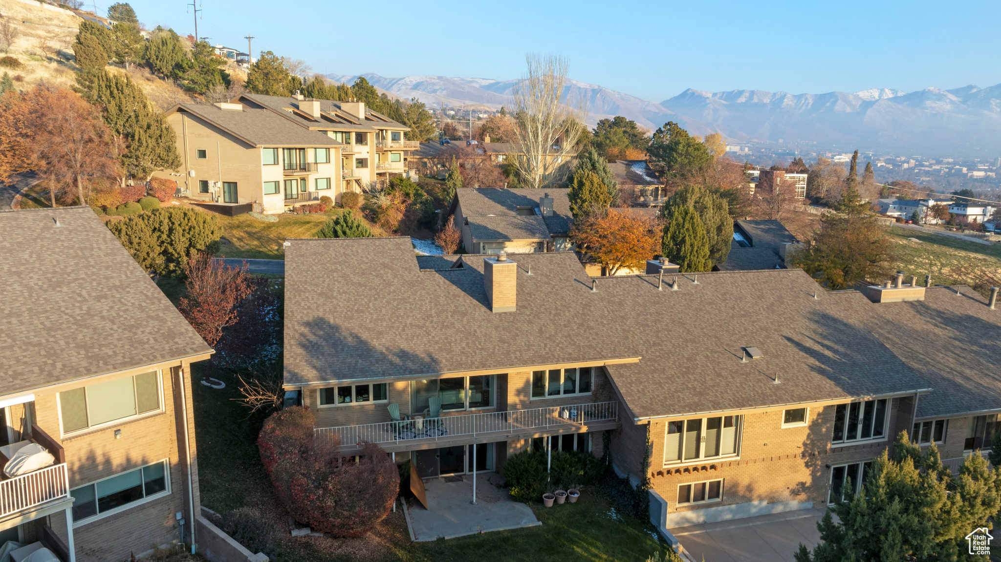 Birds eye view of property with a mountain view