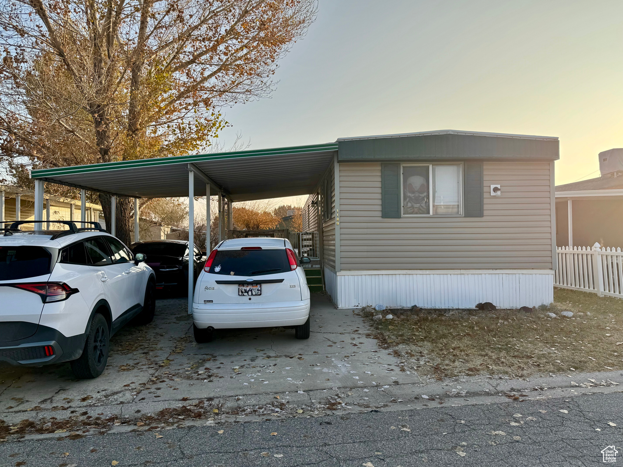 View of front of home featuring a carport