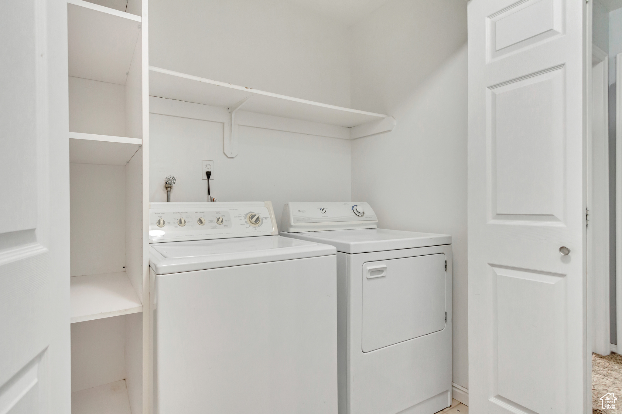 Laundry area with separate washer and dryer