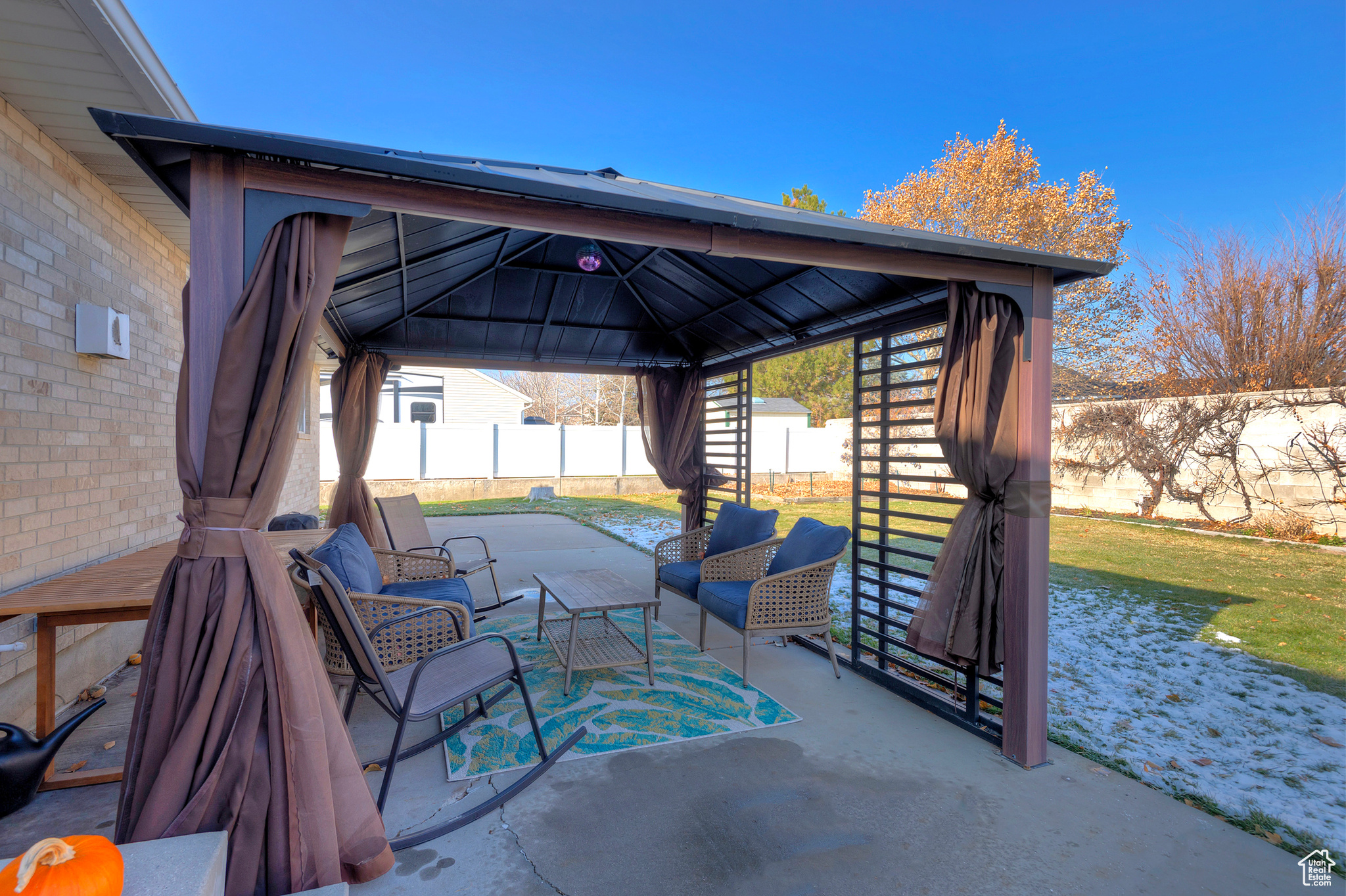 View of patio / terrace featuring a gazebo and an outdoor hangout area