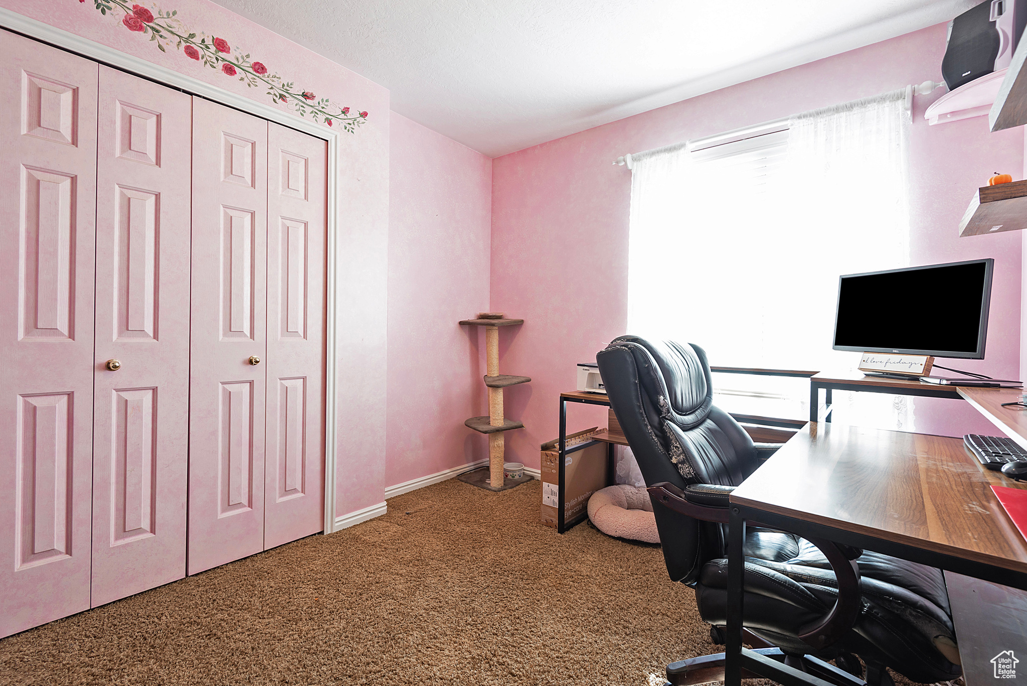 View of carpeted home office