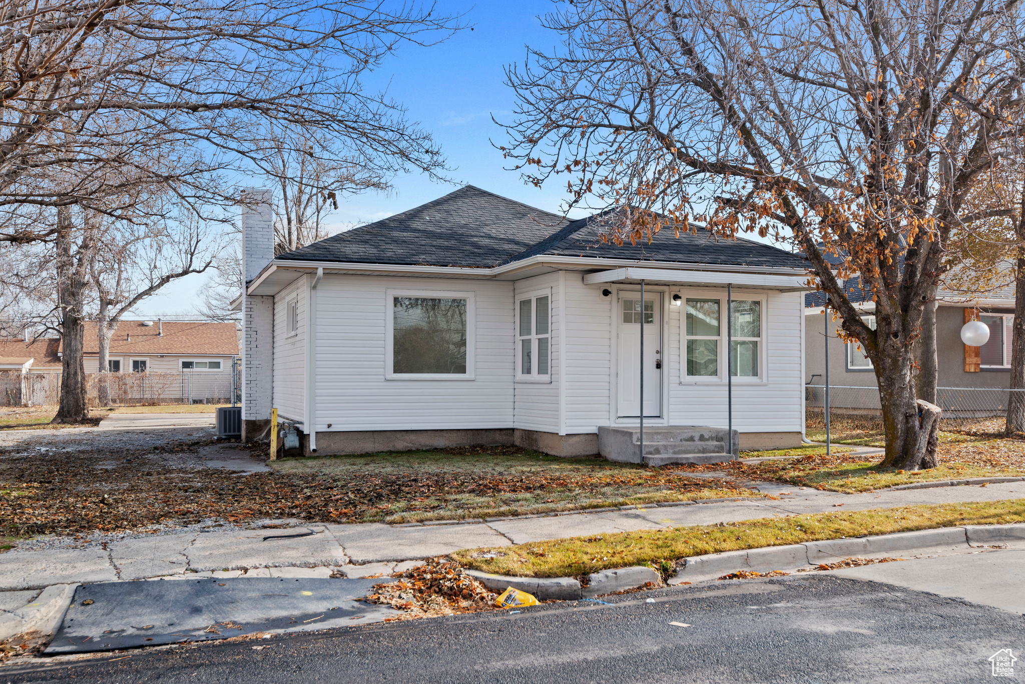 Bungalow featuring central AC unit