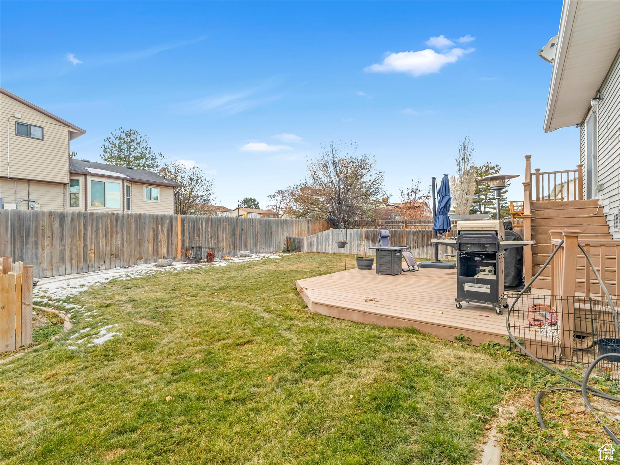 View of yard with a deck