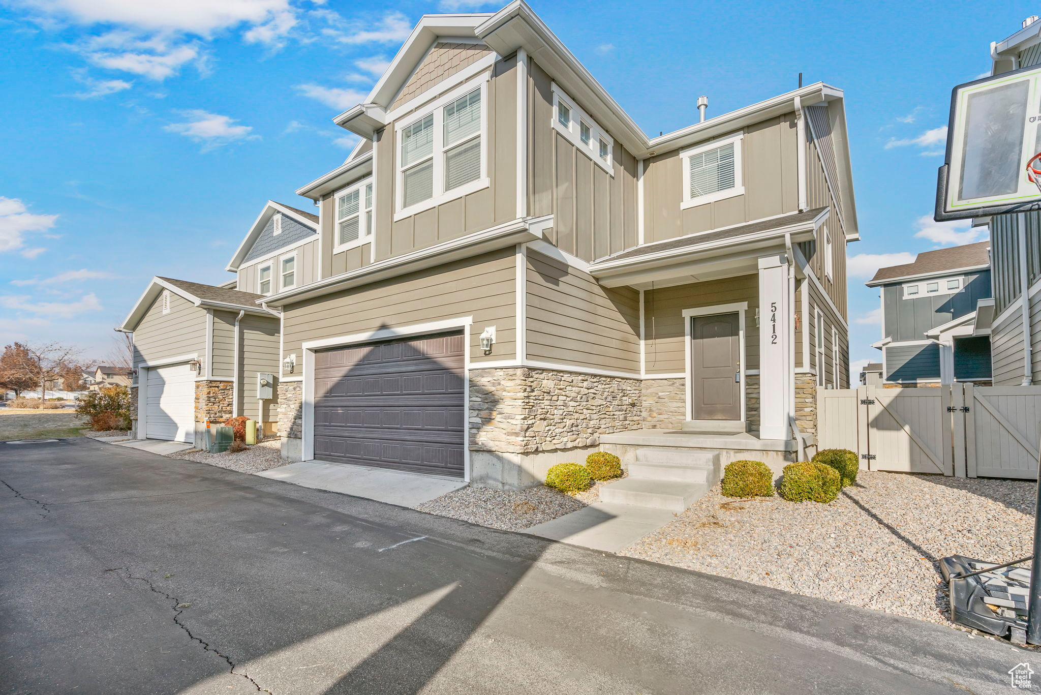 View of property with a garage