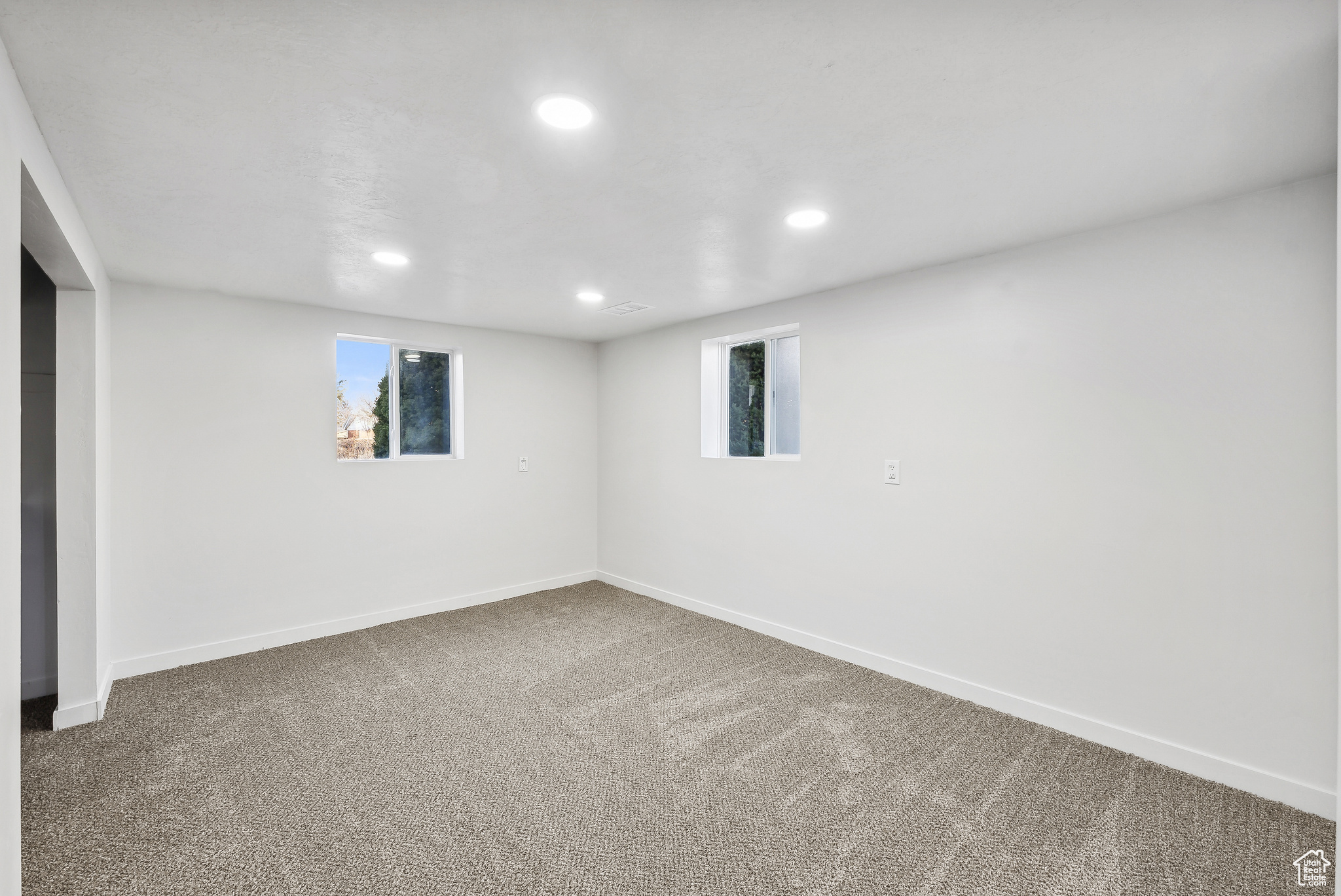 Basement with carpet flooring