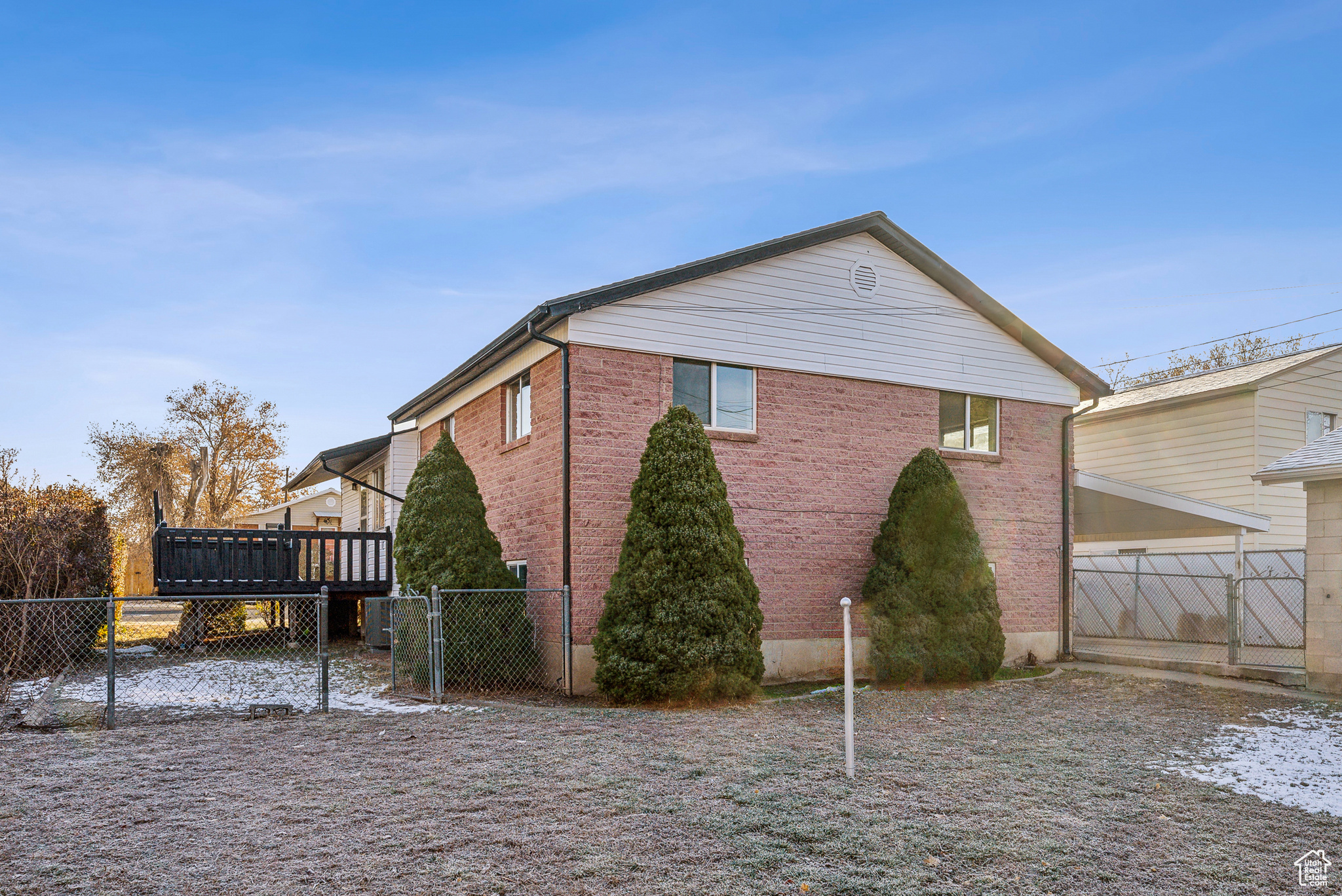 View of home's exterior with a deck