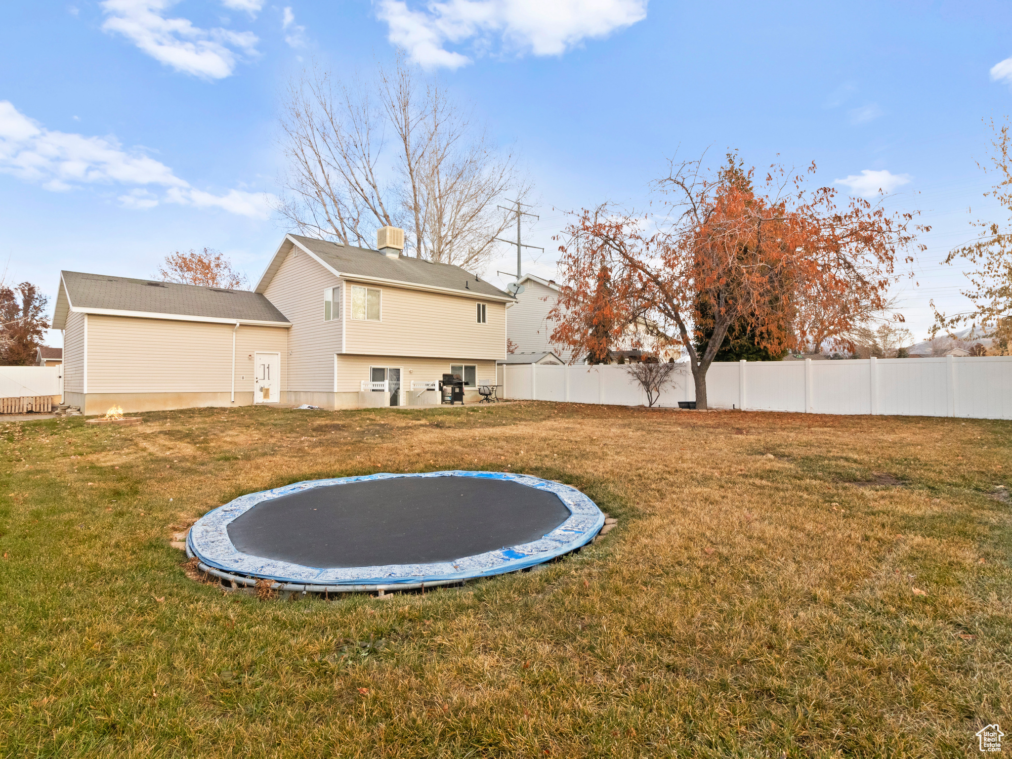 View of yard featuring a trampoline