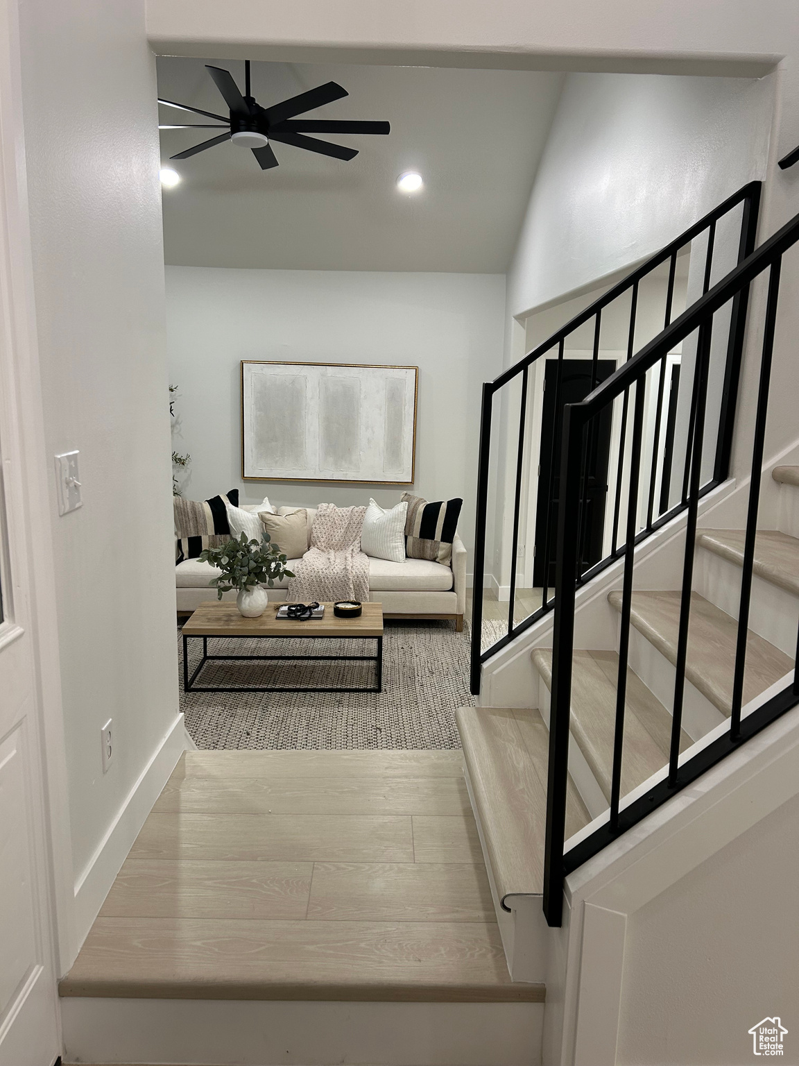 Corridor featuring hardwood / wood-style flooring