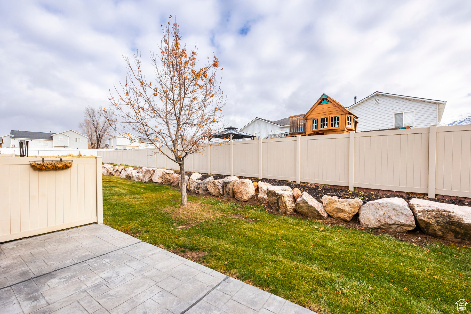 View of yard with a patio